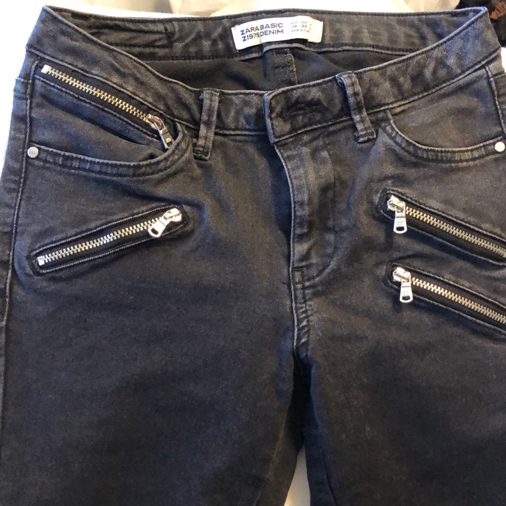 Black skinny jeans with zippers